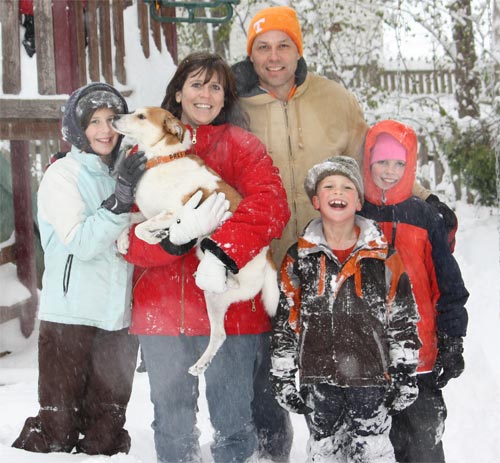 family in snow.