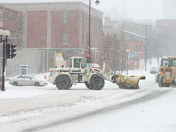 snowplow clearing snow in montreal