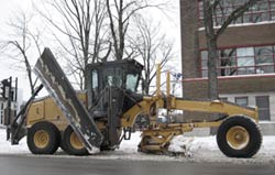 a snow plow is used to clear the roads of snow