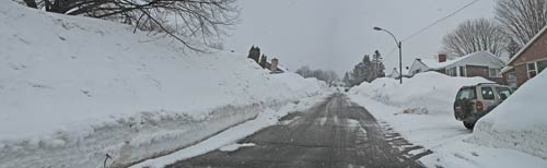 this panorama picture shows a snowy Quebec city neighborhood