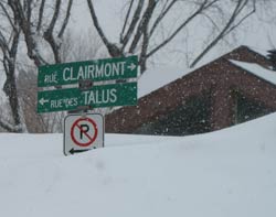 snow so deep that it buries city street signs
